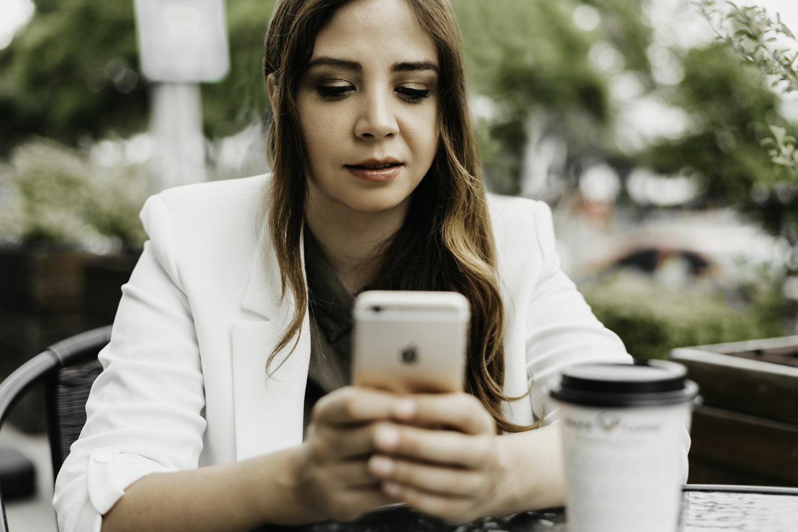 Woman scrolling Instagram on her phone